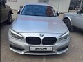 2016 BMW 1 серии 118i II (F20/F21) Рестайлинг, серый, 1300000 рублей - вид 1