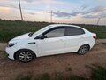 2014 Kia Rio 5-speed III, белый, 720000 рублей - вид 3