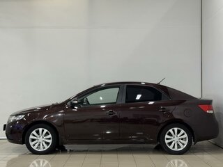 2010 Kia Cerato 5-speed II, коричневый, 559000 рублей, вид 2