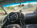 2003 Kia Shuma II, серебристый, 120000 рублей - вид 4