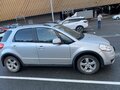2011 Suzuki SX4 I (Classic) Рестайлинг, серебристый - вид 1