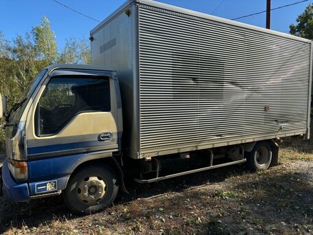 1988 Isuzu Elf (N-series), белый, 1700000 рублей, вид 2
