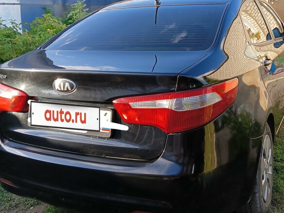2013 Kia Rio 5-speed III, чёрный, 800000 рублей - вид 6
