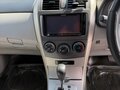 2010 Toyota Corolla Axio X (E140, E150) Рестайлинг, белый, 680000 рублей - вид 11