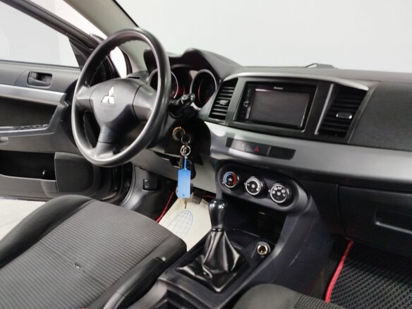 2010 Mitsubishi Lancer X, чёрный, 750000 рублей - вид 13