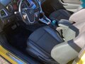 2013 Opel Astra GTC J Рестайлинг, жёлтый, 750000 рублей - вид 6