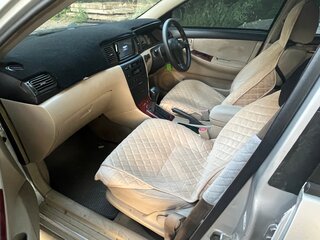 2001 Toyota Corolla Runx IX (E120, E130), серый, 350000 рублей, вид 4