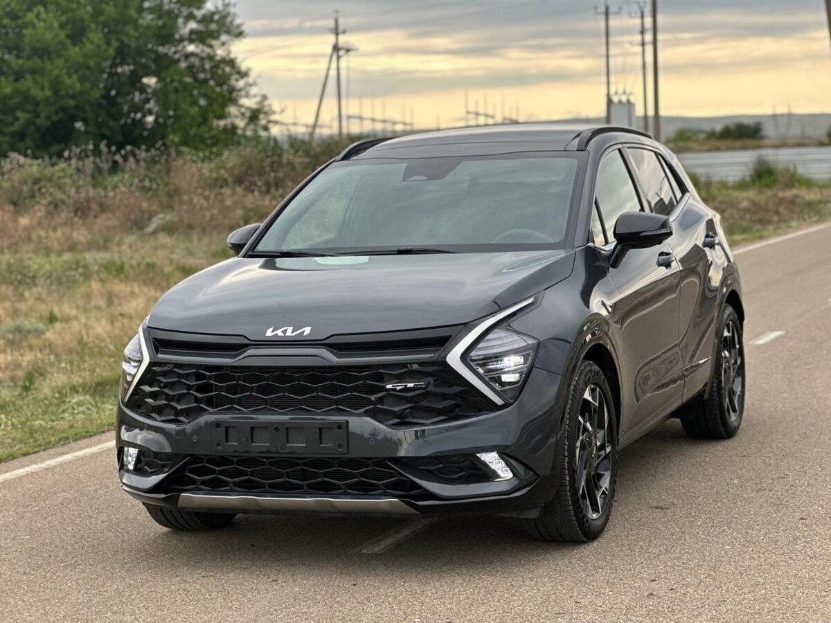 Открыть фотографии: Kia Sportage V