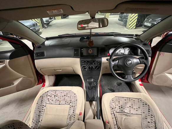 2001 Toyota Corolla Runx IX (E120, E130), красный, 450000 рублей - вид 7