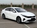 2023 Kia K3 II (China Market) Рестайлинг, белый - вид 1