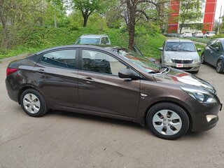 2015 Hyundai Solaris I Рестайлинг, коричневый, 920000 рублей, вид 5