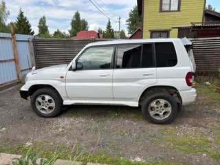 1999 Mitsubishi Pajero iO, белый, 520000 рублей, вид 3