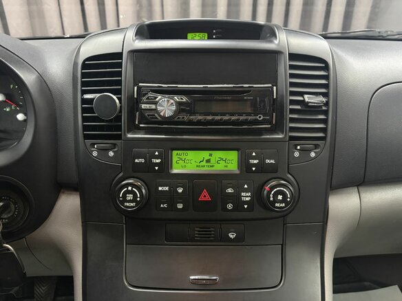 2007 Kia Carnival Grand II, серебристый, 599900 рублей - вид 14