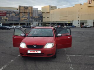 2001 Toyota Corolla Runx IX (E120, E130), красный, 480000 рублей, вид 2