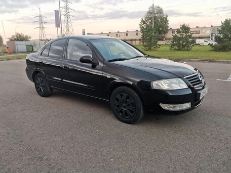 2010 Nissan Almera Classic I, чёрный, вид 2
