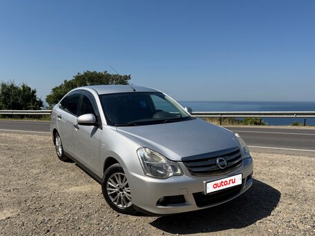 2014 Nissan Almera III (G15), серебристый, вид 2