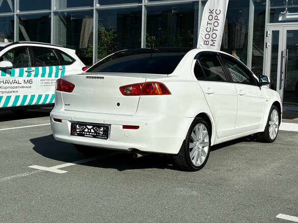 2007 Mitsubishi Lancer X, белый - вид 5