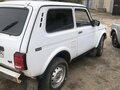2004 Lada (ВАЗ) 2121 (4x4) I Рестайлинг, белый, 225000 рублей - вид 1
