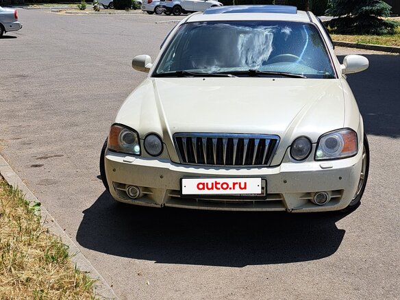 2004 Kia Magentis I Рестайлинг, белый, 600000 рублей