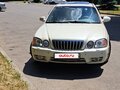 2004 Kia Magentis I Рестайлинг, белый, 600000 рублей