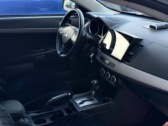 2011 Mitsubishi Lancer X Рестайлинг, зелёный, 644000 рублей - вид 11