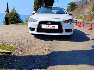 2012 Mitsubishi Lancer X Рестайлинг, белый, 680000 рублей, вид 1