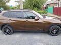 2013 BMW X1 20i I (E84) Рестайлинг, коричневый, 1360000 рублей - вид 8