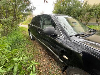 2004 Kia Opirus I, чёрный, 470000 рублей, вид 4