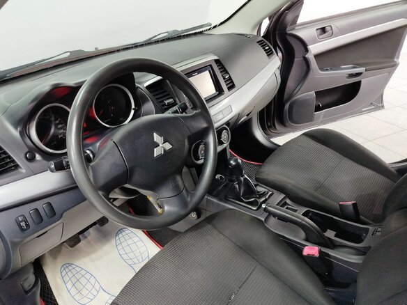 2010 Mitsubishi Lancer X, чёрный, 750000 рублей - вид 19