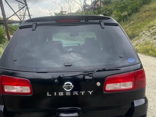 2001 Nissan Liberty, чёрный, 650000 рублей, вид 4