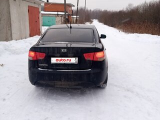 2011 Kia Cerato 6-speed II, чёрный, 930000 рублей, вид 3