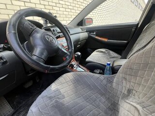 2006 Toyota Corolla IX (E120, E130) Рестайлинг, чёрный, 600000 рублей, вид 3