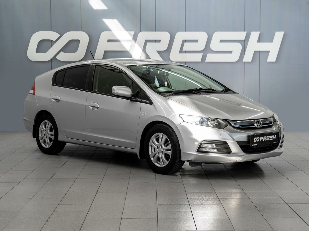 Открыть фотографии: Honda Insight II Рестайлинг