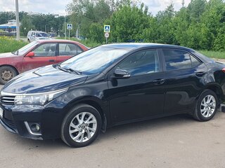 2014 Toyota Corolla XI (E160, E170, E180), чёрный, 1089000 рублей, вид 1