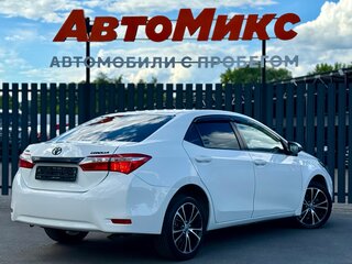 2014 Toyota Corolla XI (E160, E170, E180), белый, 990000 рублей, вид 4