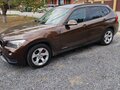 2013 BMW X1 20i I (E84) Рестайлинг, коричневый, 1360000 рублей - вид 1