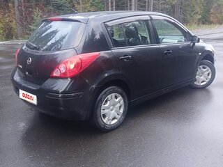2010 Nissan Tiida I Рестайлинг, чёрный, 569000 рублей, вид 2