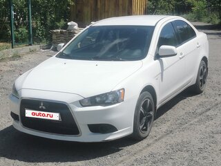 2013 Mitsubishi Lancer X Рестайлинг, белый, 950000 рублей, вид 1