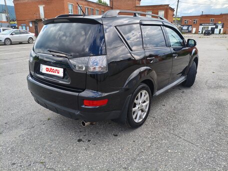 2011 Mitsubishi Outlander II Рестайлинг, чёрный, 880000 рублей, вид 4
