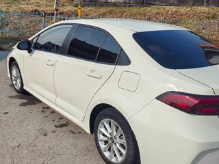 2021 Toyota Corolla XII (E210), белый, 1450000 рублей, вид 4