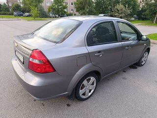 2011 Chevrolet Aveo I Рестайлинг, серебристый, 449000 рублей, вид 4