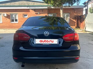 2014 Volkswagen Jetta VI Рестайлинг, чёрный, 600000 рублей, вид 4