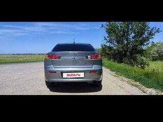 2012 Mitsubishi Lancer X Рестайлинг, серебристый, 1350000 рублей, вид 1