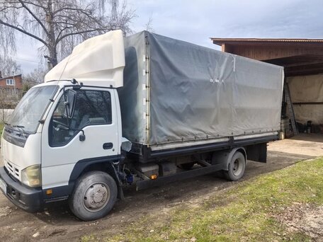 2010 Isuzu Elf (N-series), белый, 1550000 рублей, вид 3