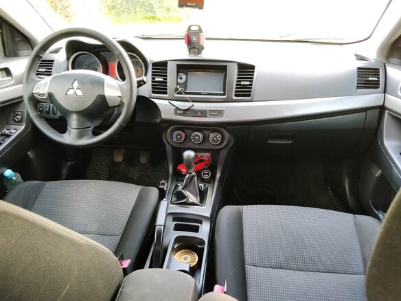 2008 Mitsubishi Lancer X, красный - вид 5