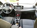 2008 Mitsubishi Lancer X, красный - вид 5