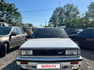 1985 Nissan Bluebird VII (U11), белый, 800000 рублей, вид 1