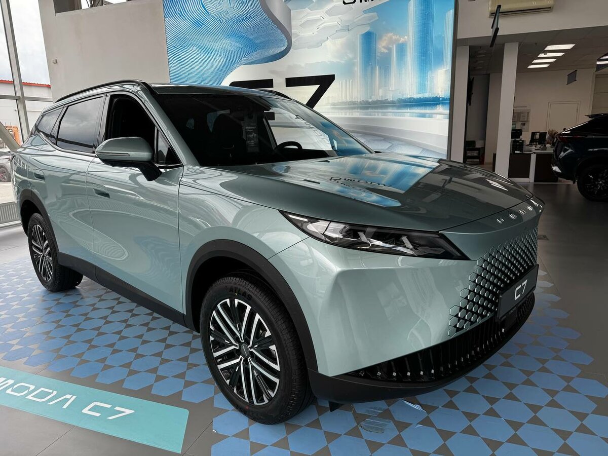 Открыть фотографии: Omoda C7