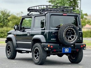 2023 Suzuki Jimny Sierra IV, серый, 2230004 рублей, вид 4