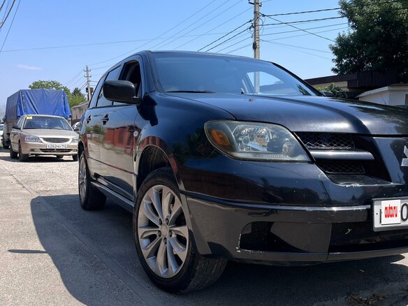2002 Mitsubishi Outlander I, чёрный, 500000 рублей - вид 6